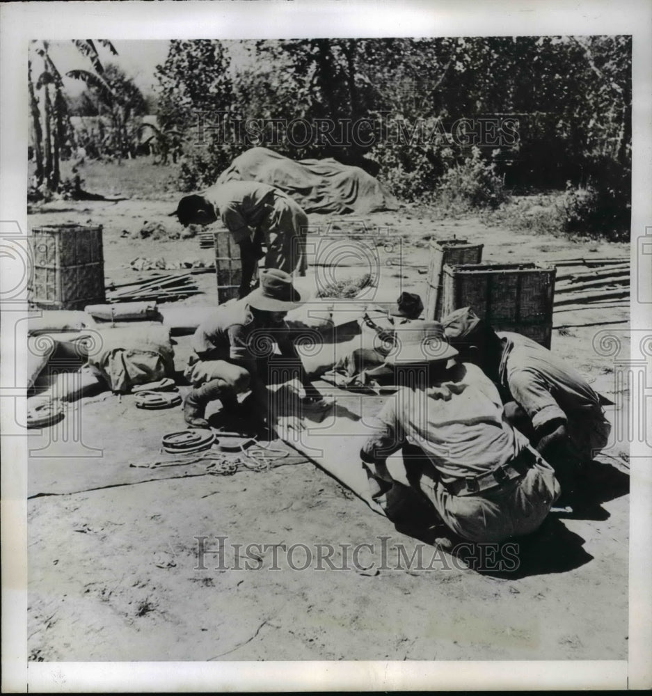 1943 Press Photo Rubber Dinghies Are Being Folded to be Dropped by Parachutes-Historic Images