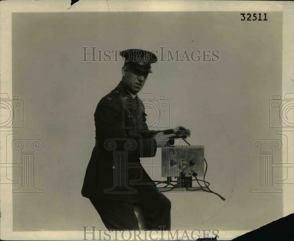 1927 Captain Paul Edwards of Army Corps holds the Signaling device - Historic Images