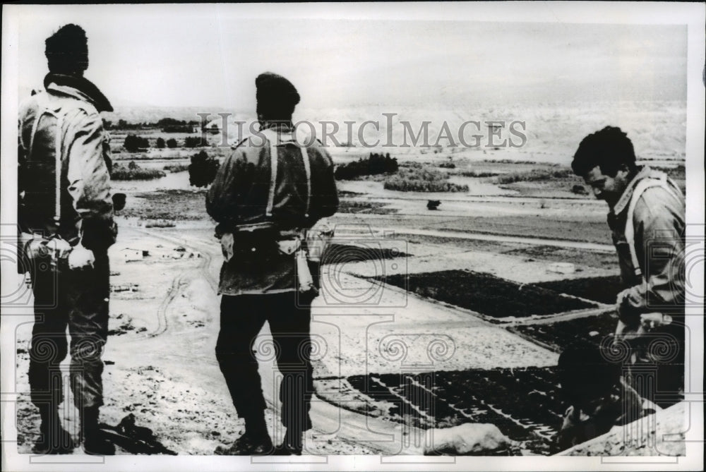 1968 Israeli soldiers stand on a hilltop following an attack - Historic Images