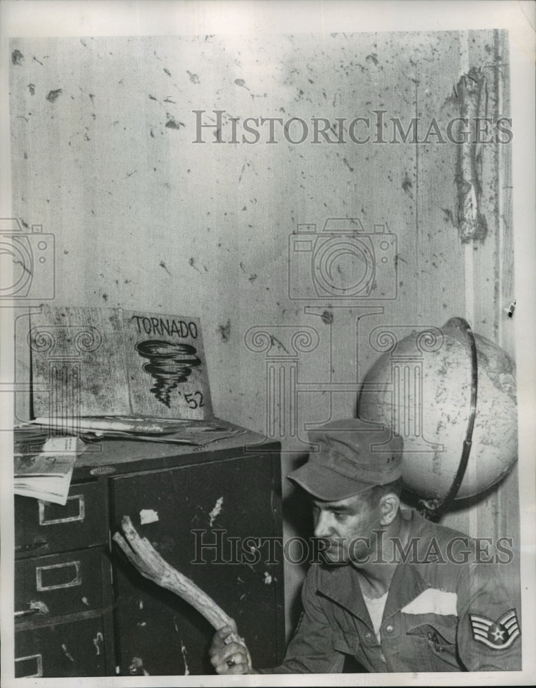 1955 Press Photo Soldier inspects damages at Undall High School after a tornado-Historic Images