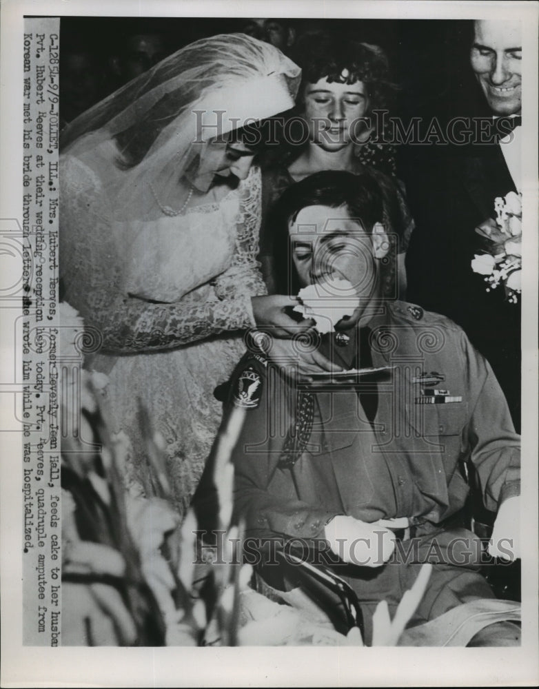 1951 Press Photo Mrs Hubert Reeves feeds cake to her husband at reception-Historic Images