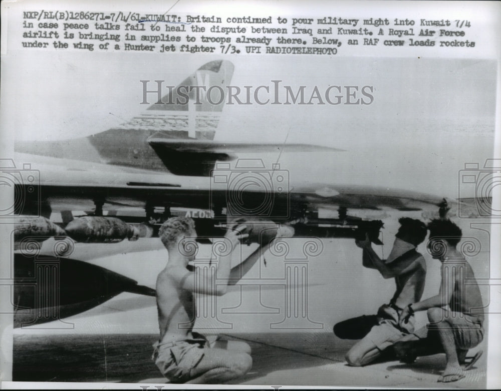 1961 Press Photo Royal Air Force crew load rockets into a Hunter Jet Fighter-Historic Images