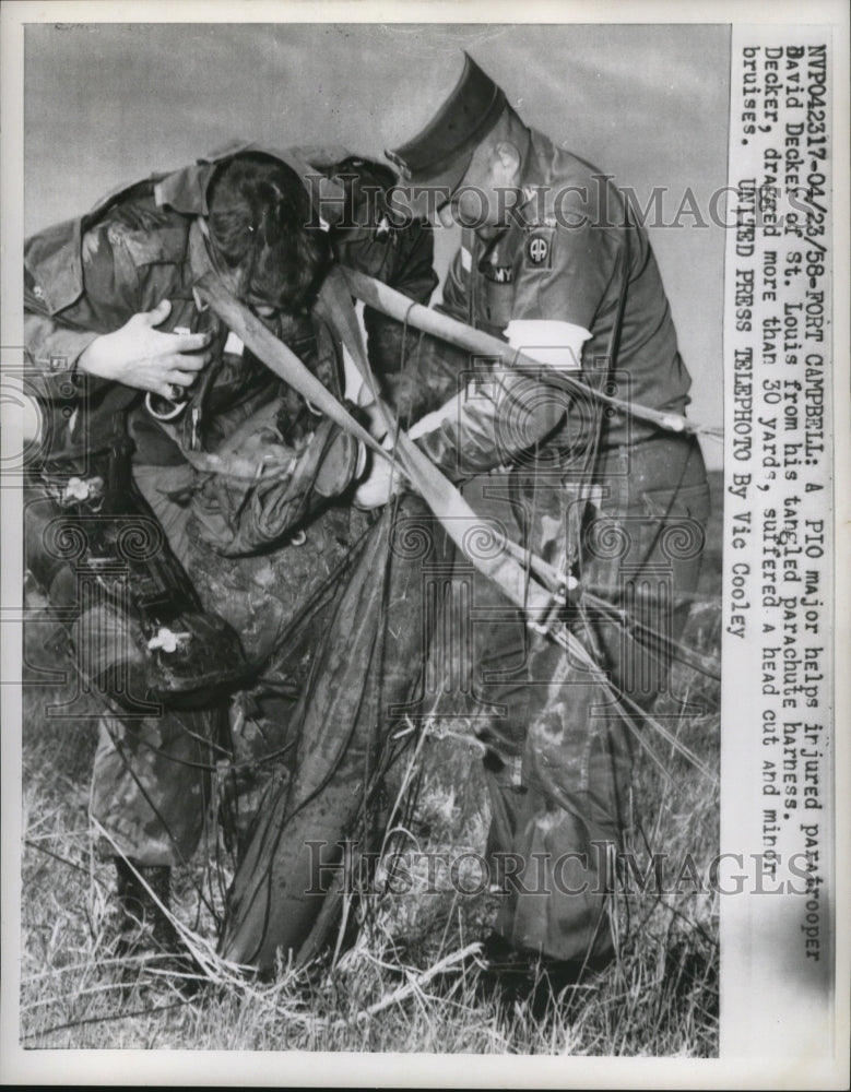 1958 Press Photo Injured Paratrooper David Decker is Helped From Harness by PIO-Historic Images