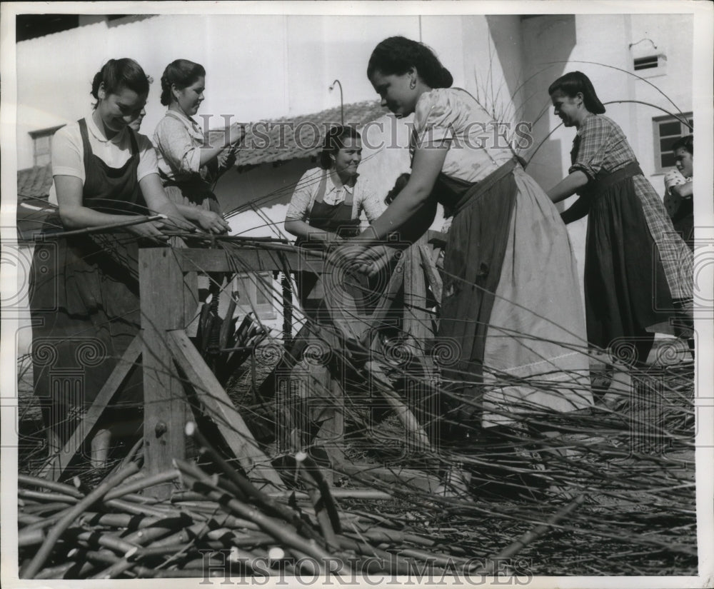 1957 Women Work Outside Stripping Bark From the Vima - Historic Images