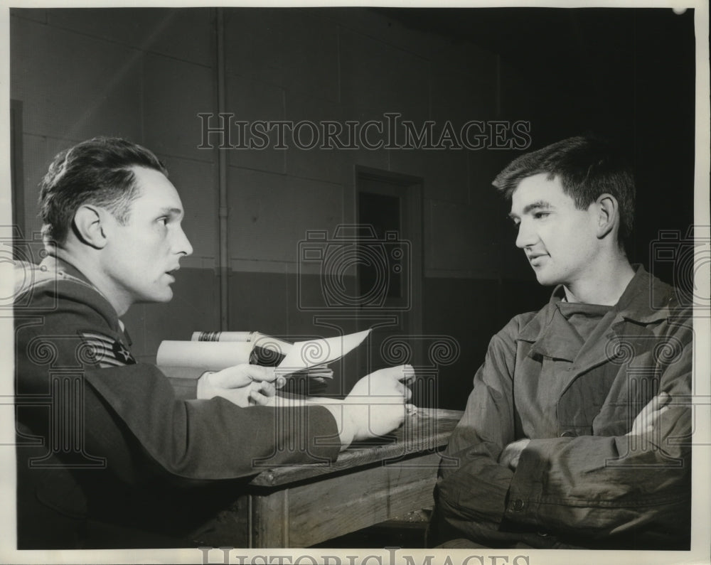 1951 Airman being interviewed by a trained counselor - Historic Images