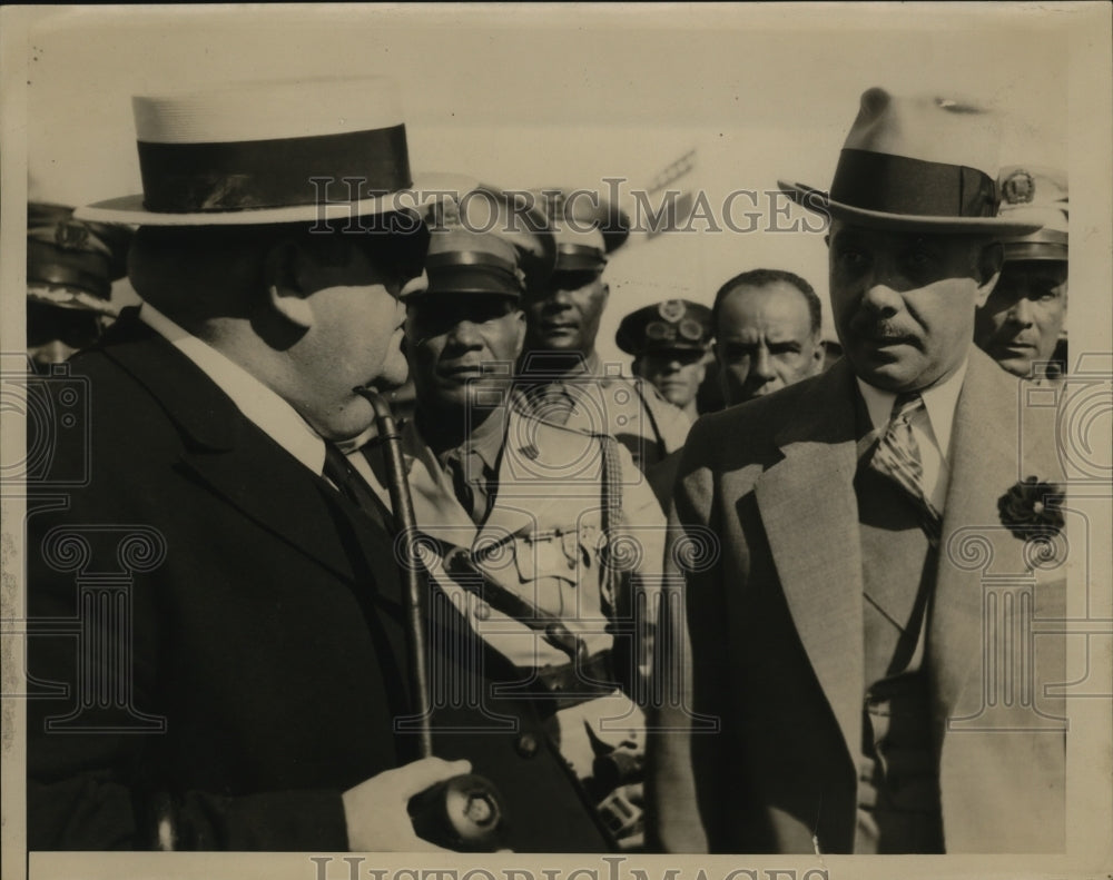 1940 Of Soldiers and Men Standing in Font of them - Historic Images