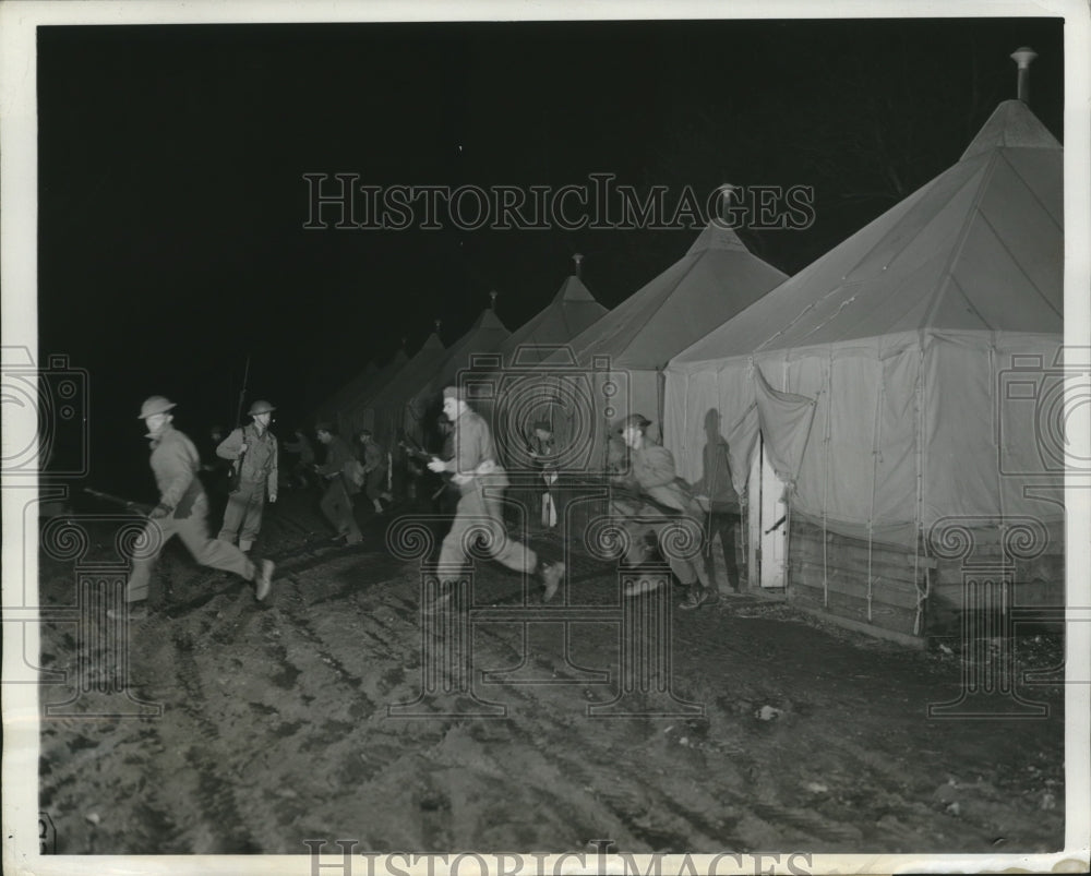 1942 Soldiers rush on anti aircraft night alert on the Eastern Coast - Historic Images