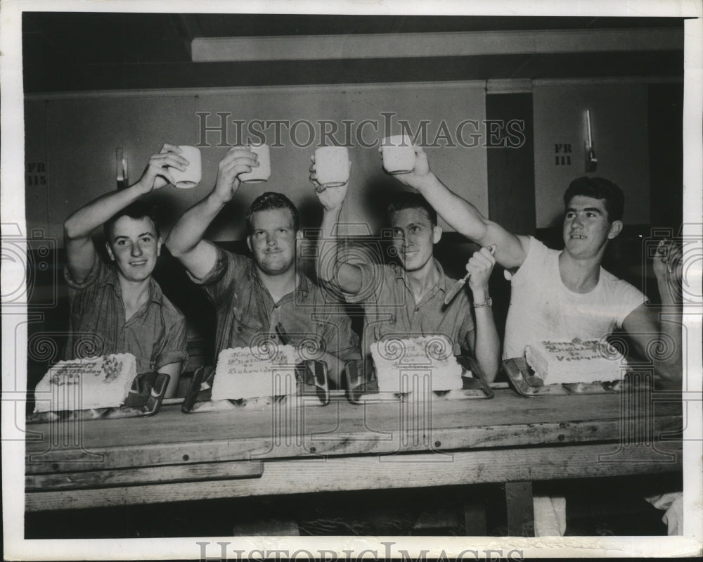 1943 Four American seamen propose a toast to their mutual birthday - Historic Images