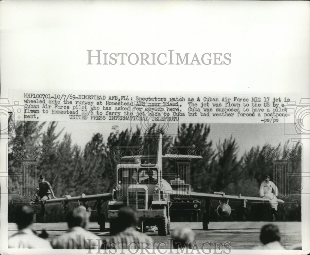 1969 Press Photo Spectators watch Cuban Air Force MIG 17 Jet Wheeled on Runway-Historic Images