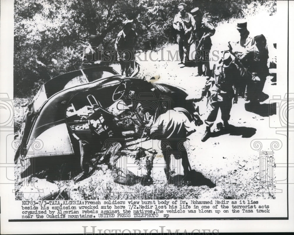 1956 Press Photo French Soldiers inspect explosion wrecked auto of Dr. Medir - Historic Images