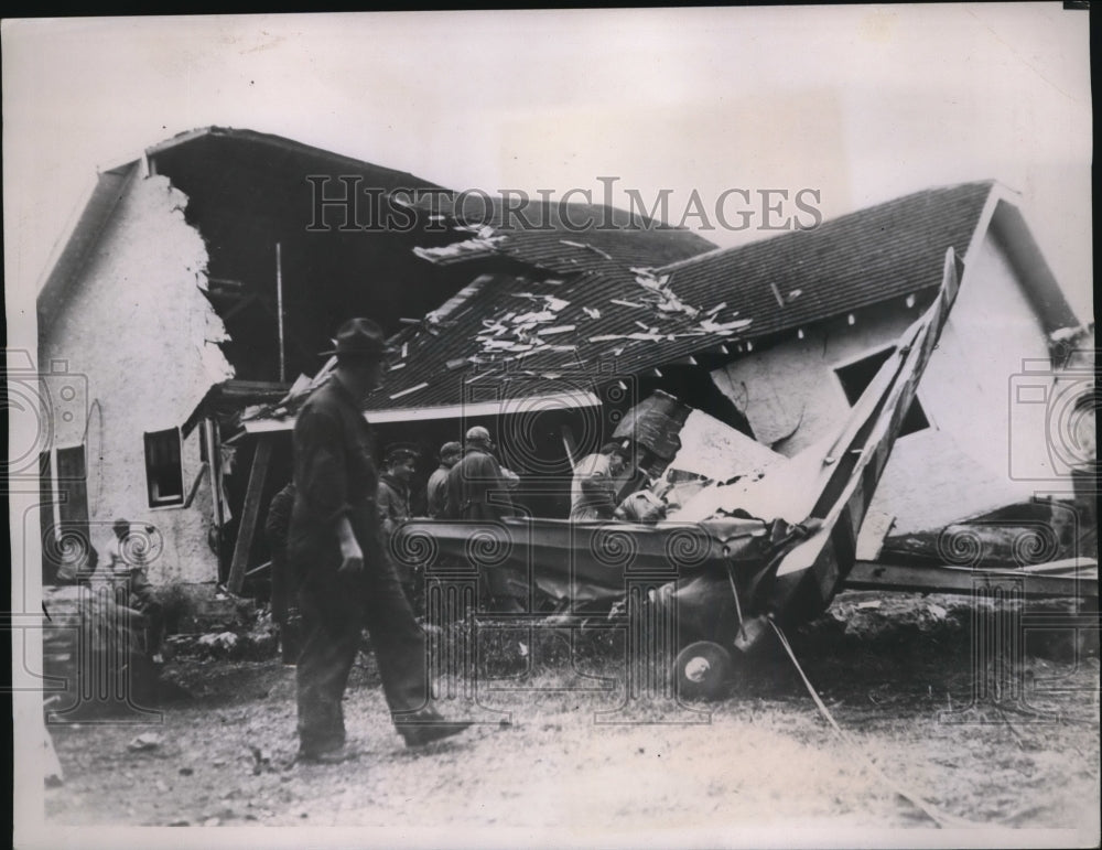 1937 Spencer Albright looks where plane crashed killed a little boy - Historic Images