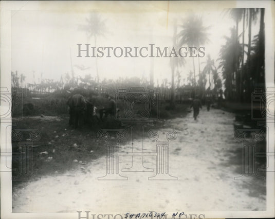 1944 First Cavalry Division in heavy rains at Los Negros Island - Historic Images