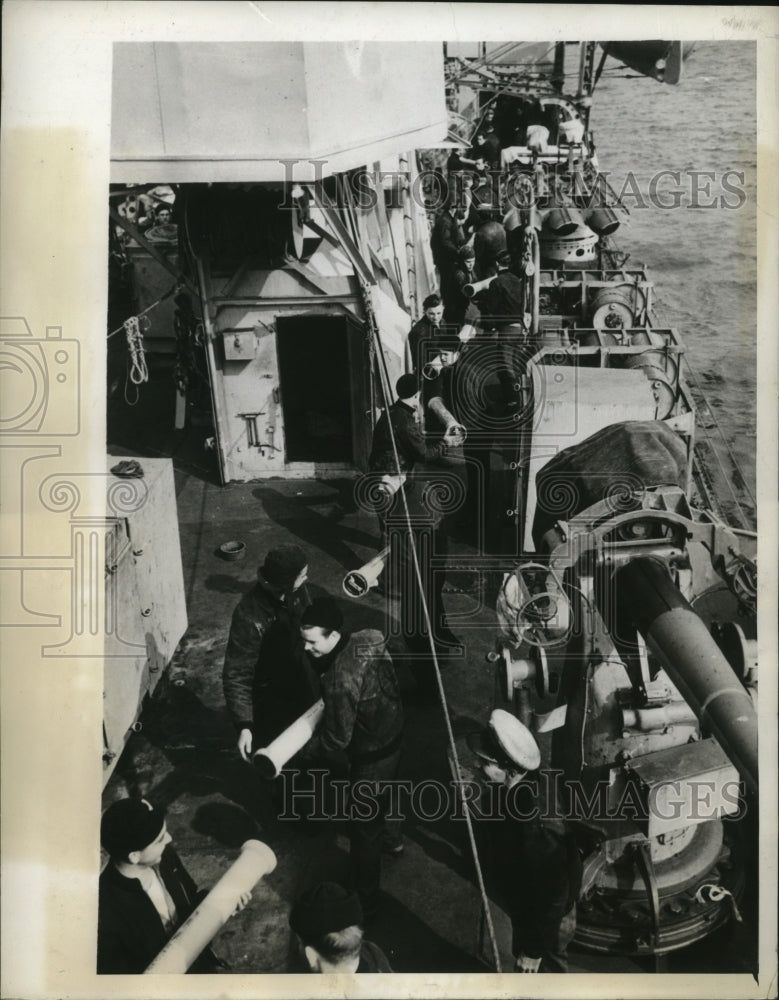 1943 Ammunition line along the deck of Destroyer in North Atlantic - Historic Images
