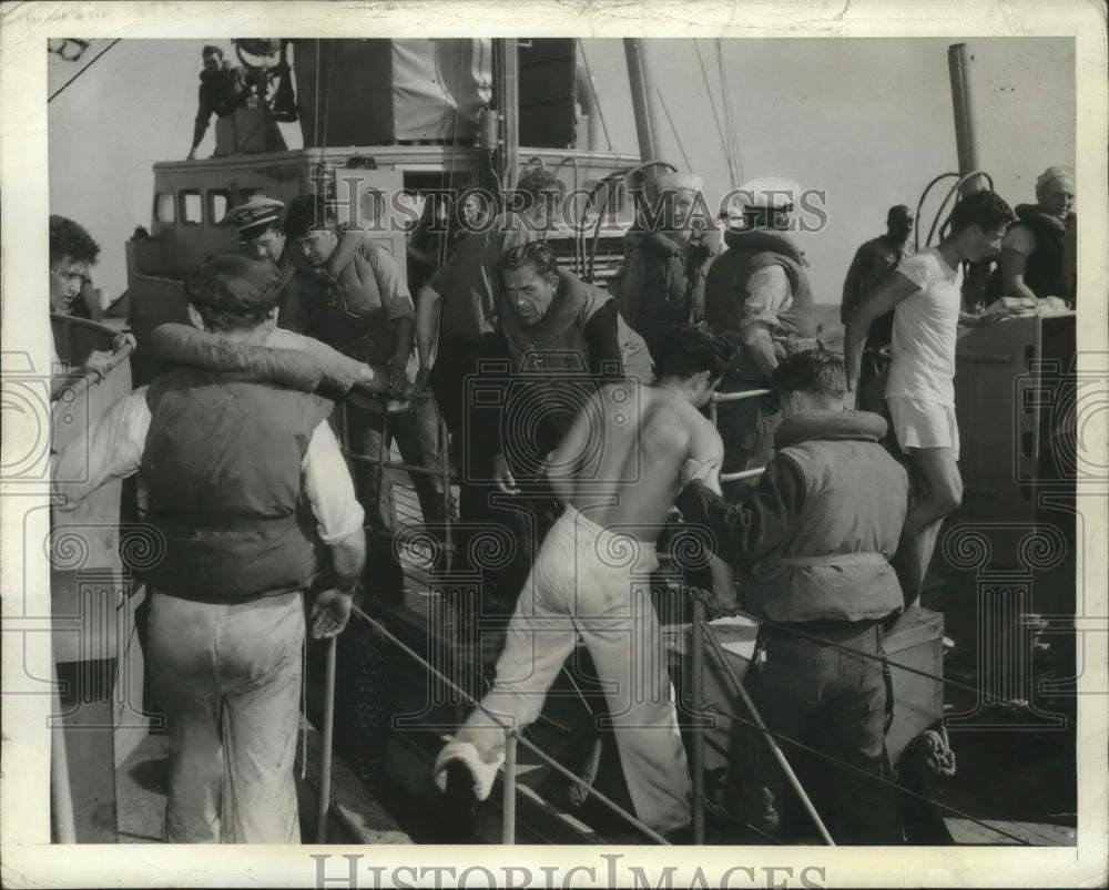 1942 Rescue Crew of sunken ship Merchant Ship at East Coast Atlantic - Historic Images