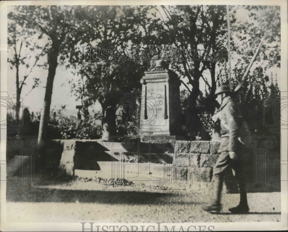 1939 French soldier guards the German Soldier Monument - Historic Images