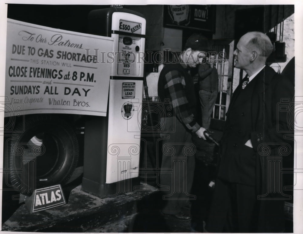 1947 New York Henry Whalen fills Leo McMahon&#39;s gas tank NYC - Historic Images