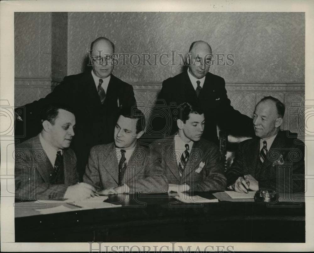 1942 Mineola NY Fathers register sons for Selective Service NYC - Historic Images