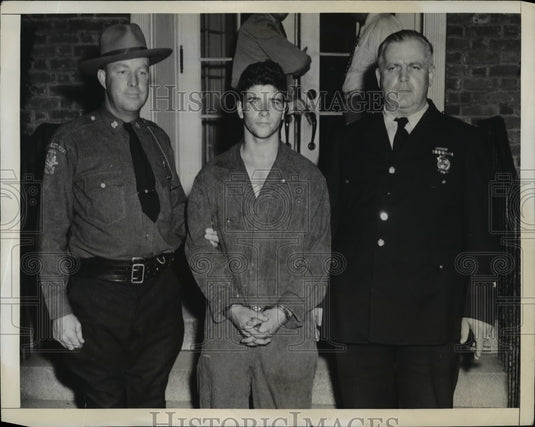 1942 Bedford Village Edward Haight escorted out of station BVNY-Historic Images