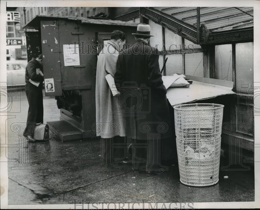 1953 Press Photo New York Trash Baskets at the Newspaper Stand in New York City - Historic Images