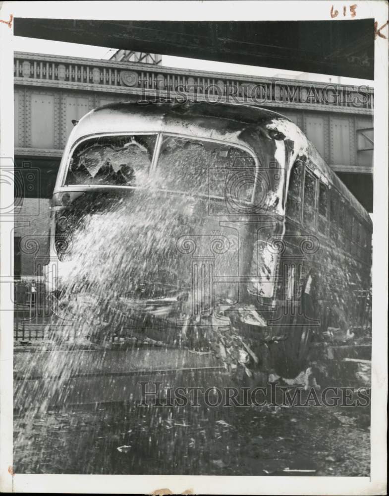 1944 Press Photo Water is poured on a burning bus following New York accident- Historic Images