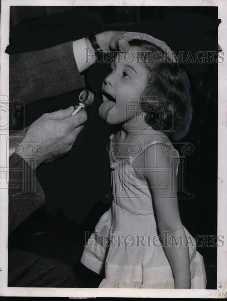 1958 Ingrid Chanan age 5 examined by a doctor Cleveland Heights Ohio - Historic Images