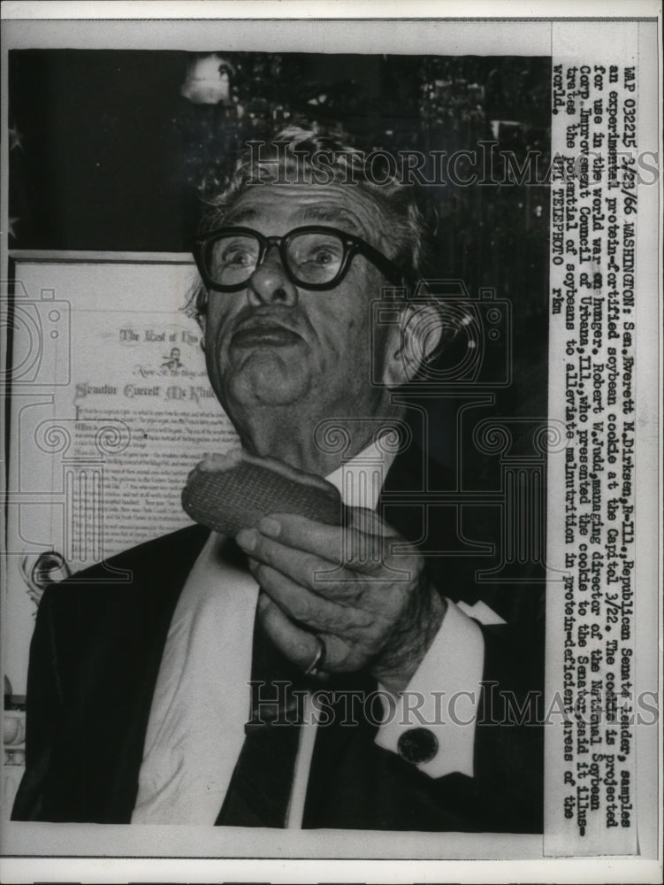 1966 Press Photo Senator Everett Dirksen Eating Soybean Cookie in Washington DC - Historic Images