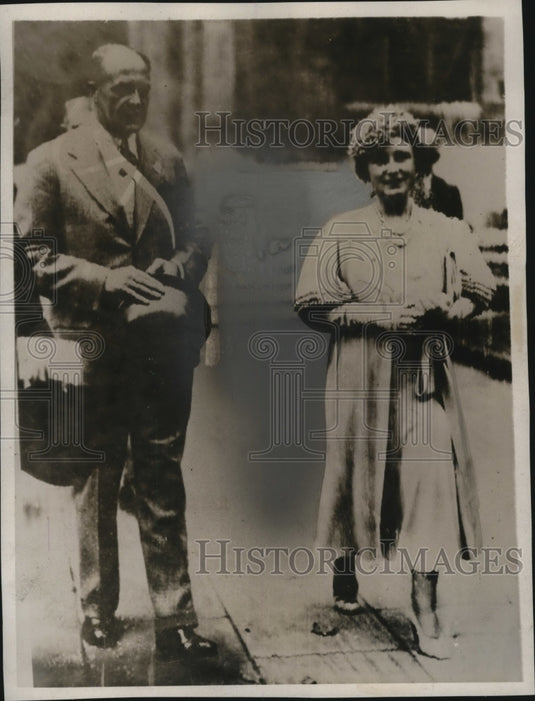 1939 Press Photo 2 people standing on street - neo06619-Historic Images