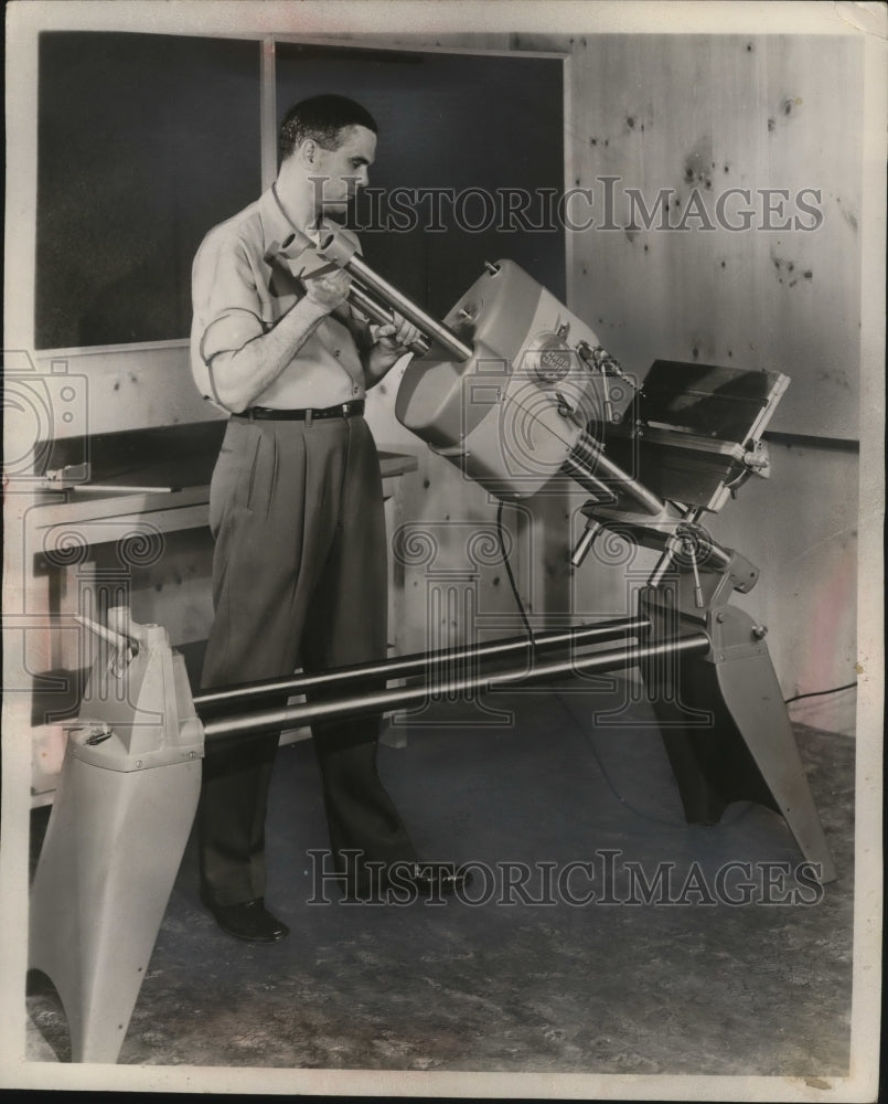1954 Man using a Power Tool  - Historic Images