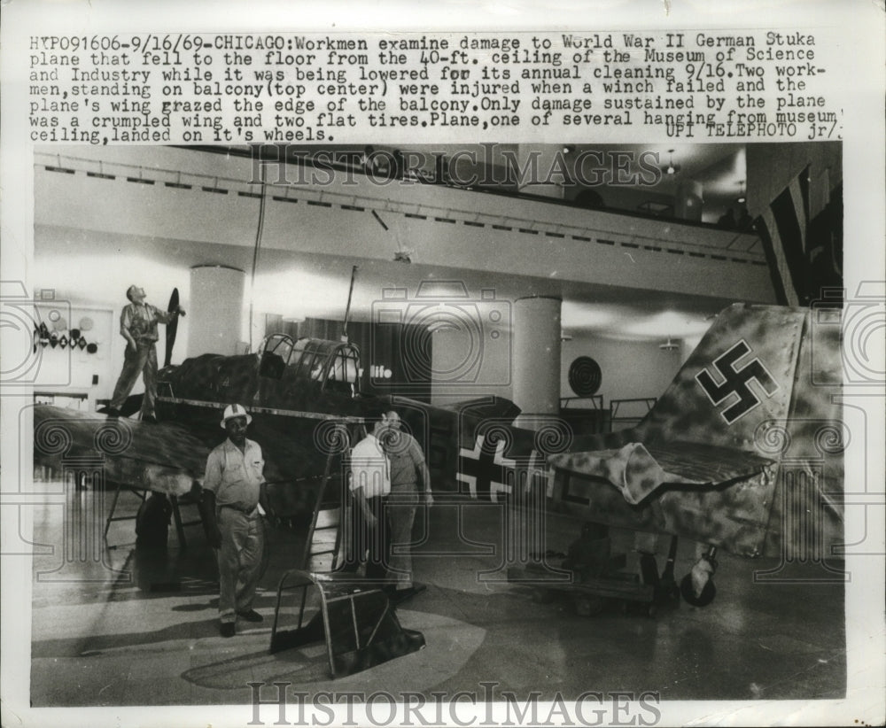1969 Press Photo Workmen & WWII German Stuka plane at Chicago Museum - neo12451-Historic Images