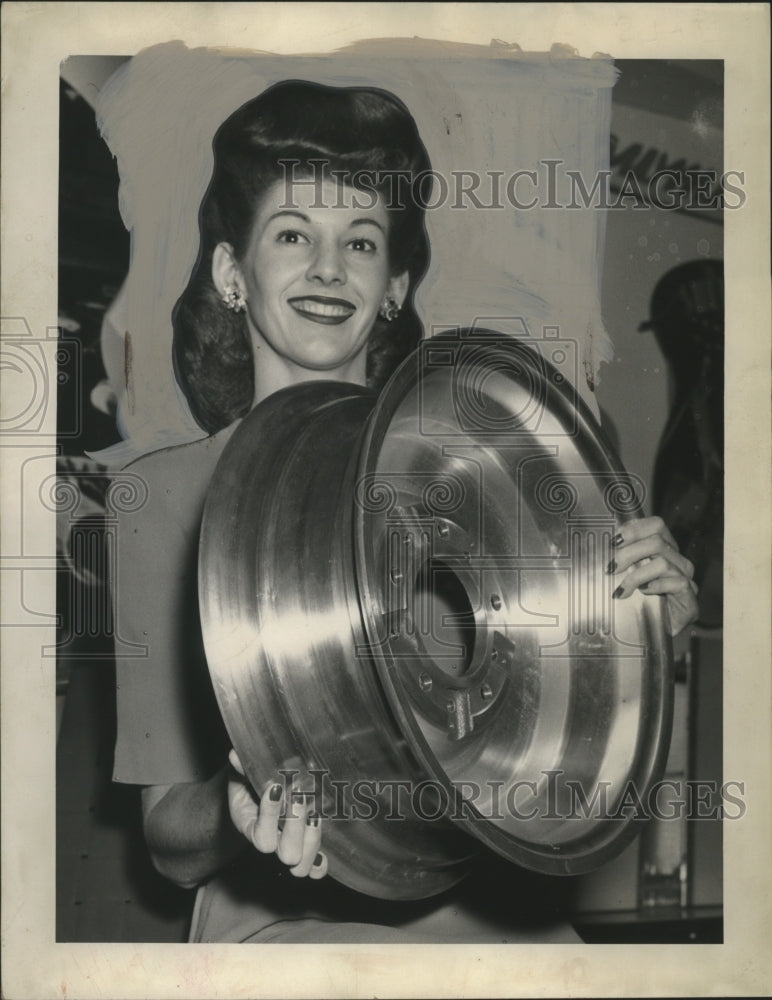 1944 Press Photo Marjorie Helman holds Magnesium automobile wheel - neo14987-Historic Images