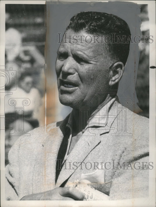 1958 Press Photo Man Holding Newspaper Under Arm - Historic Images