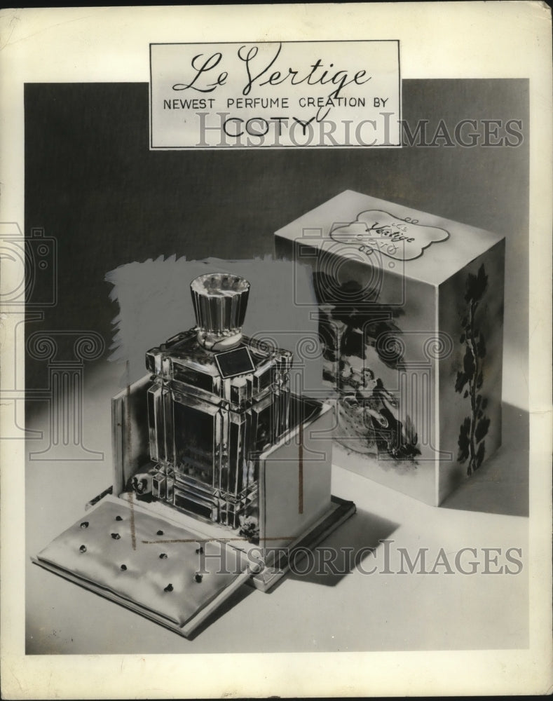 1937 Press Photo Le Vertige perfume by Coty in a decorative package - Historic Images