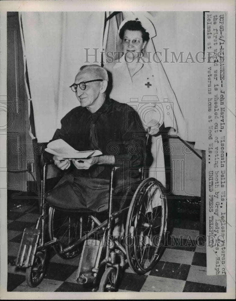 1952 Press Photo John Marvin legless Wisconsin veteran from WWI with a nurse-Historic Images