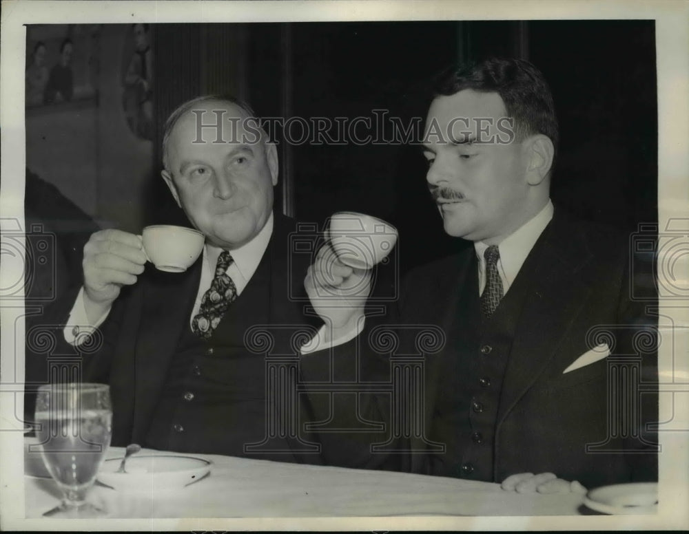 1940 Press Photo Alvin Fuller Sips Coffee With Thomas Dewey During A Luncheon-Historic Images