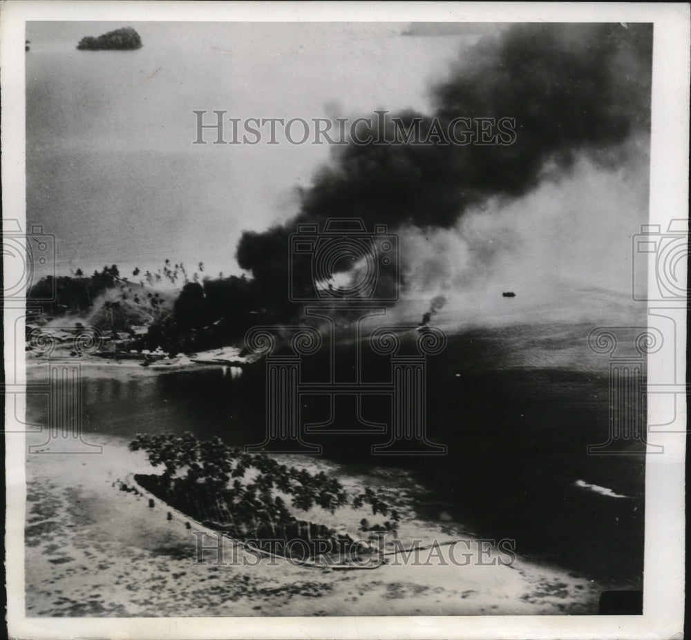 1942 Solomon Islands Japanese tender and seaplanes burn after attack - Historic Images