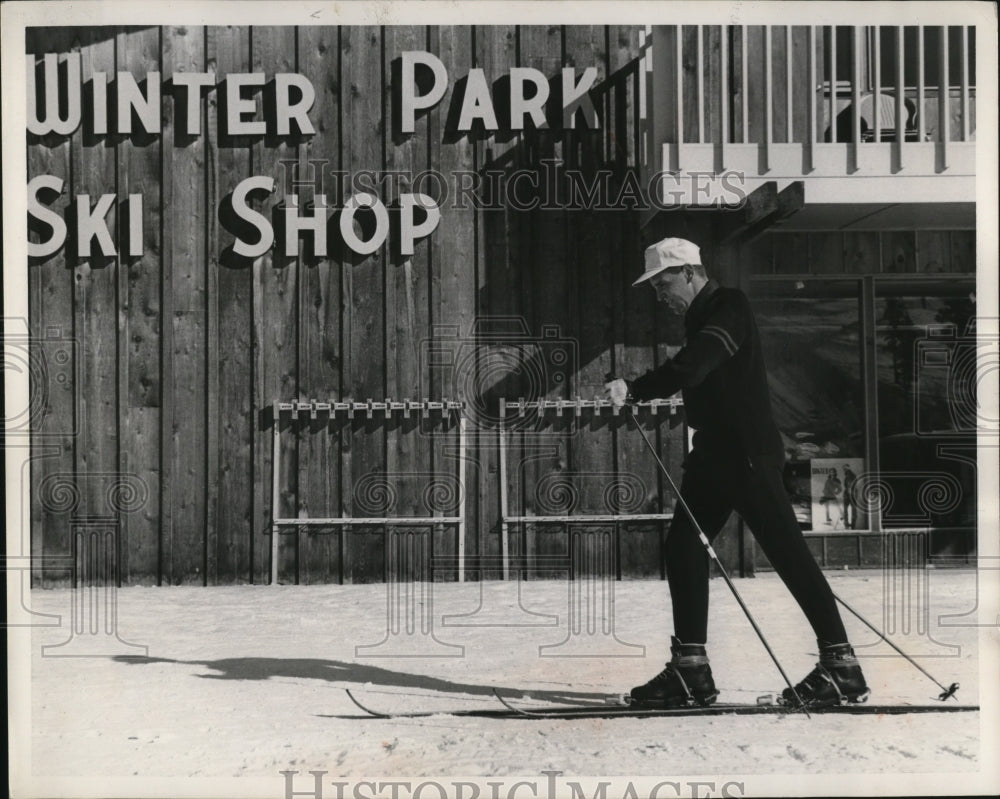 1965 George Engel demonstrates walking position while skiing - Historic Images