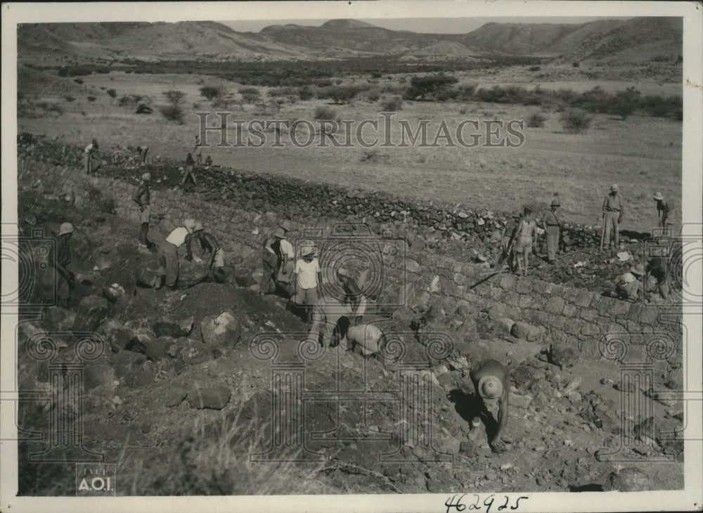 1938 Italians and native Ethiopians work on Gimma  - Historic Images