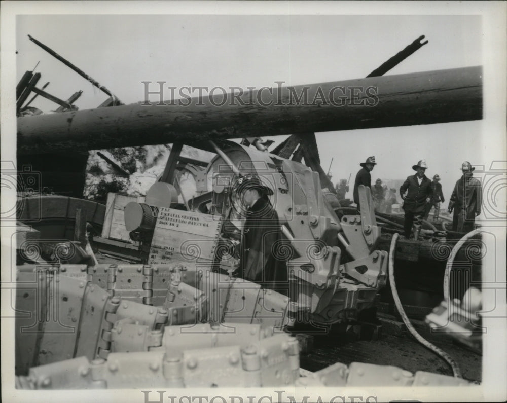 1941 Press Photo New York Firemen look over material consigned to US Navy-Historic Images