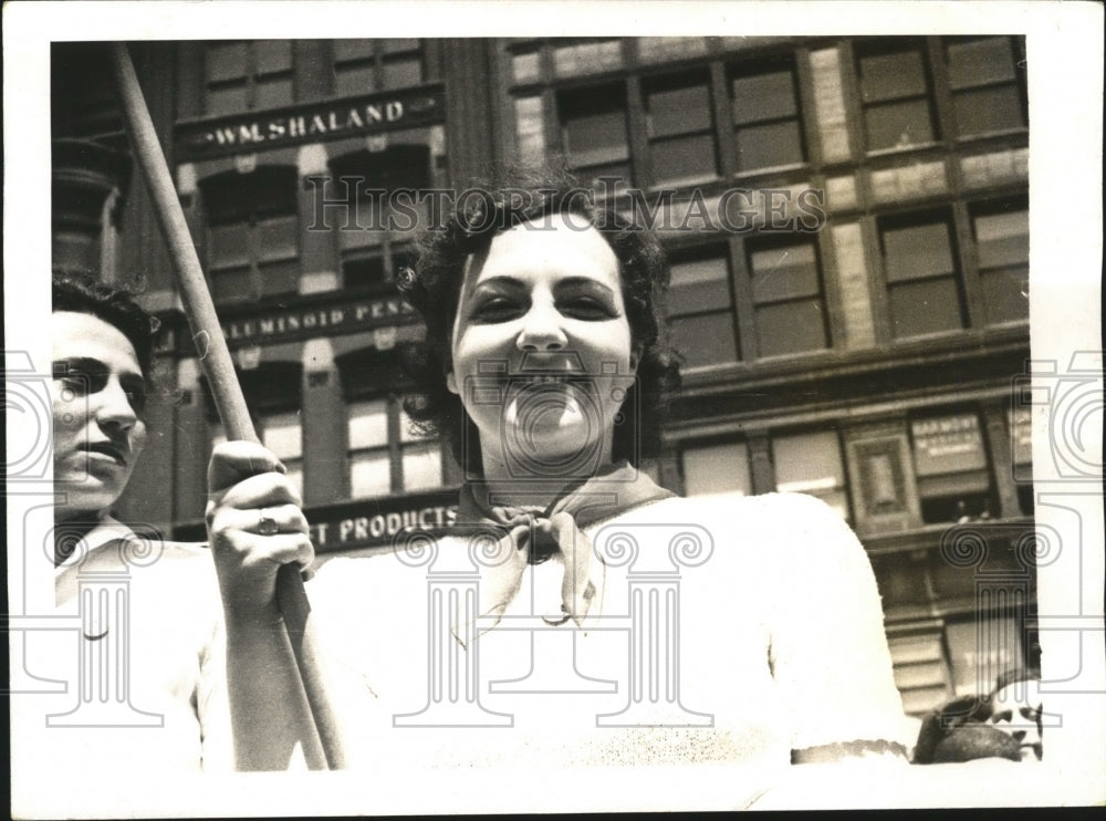 1937 Press Photo New York Girl smiles at camera during May Day Parade - Historic Images