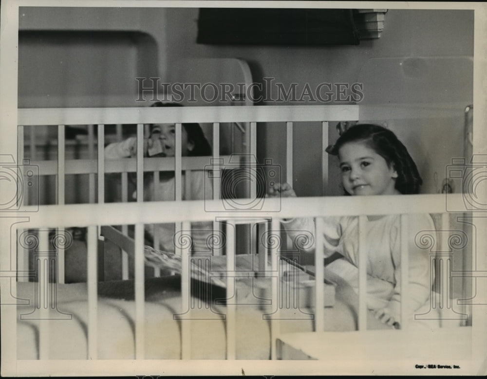 1938 Press Photo Annette and Marie in their cribs - nera11537 - Historic Images