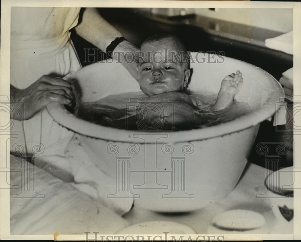 1935 Press Photo Baby Yvonne gets a warm bath - nera11634 - Historic Images