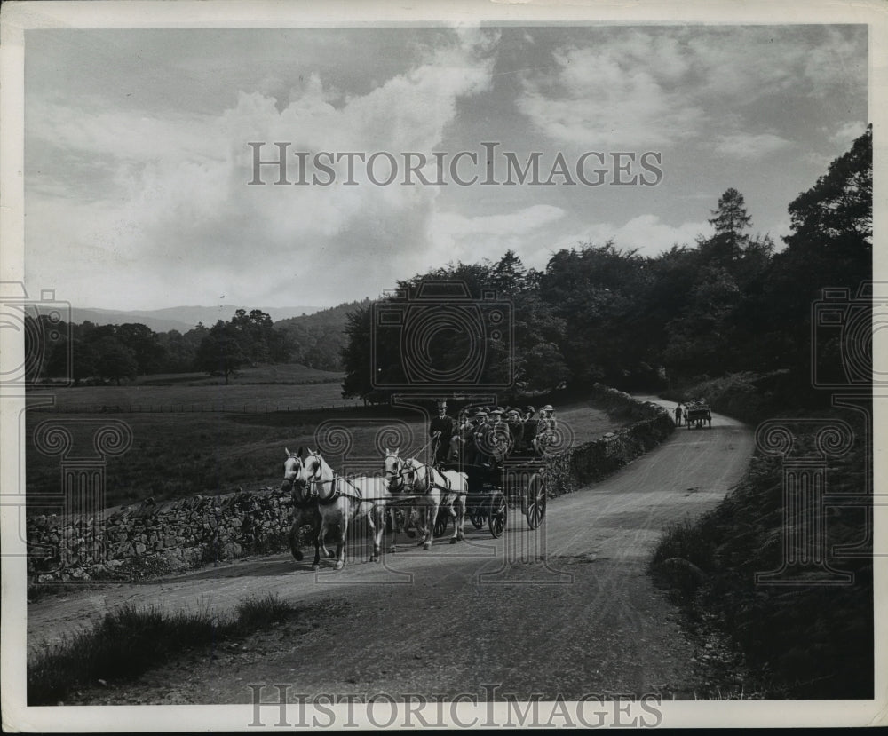 England Old fashioned horse and buggy on road in England - Historic Images