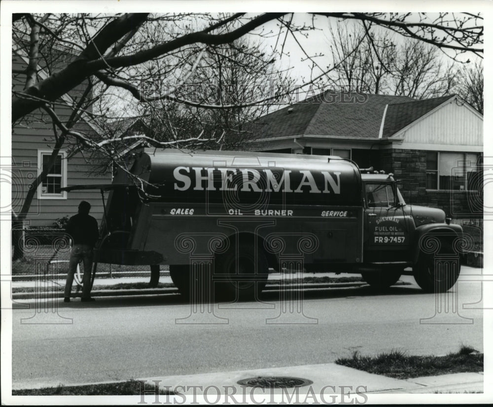 Press Photo Oil truck makes delivery to a home - nera12745 - Historic Images