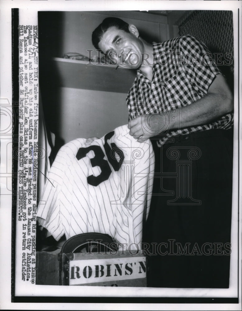 1956 Press Photo Yankee 1st Baseman Eddie Robinson Holds Uniform - nes00166 - Historic Images