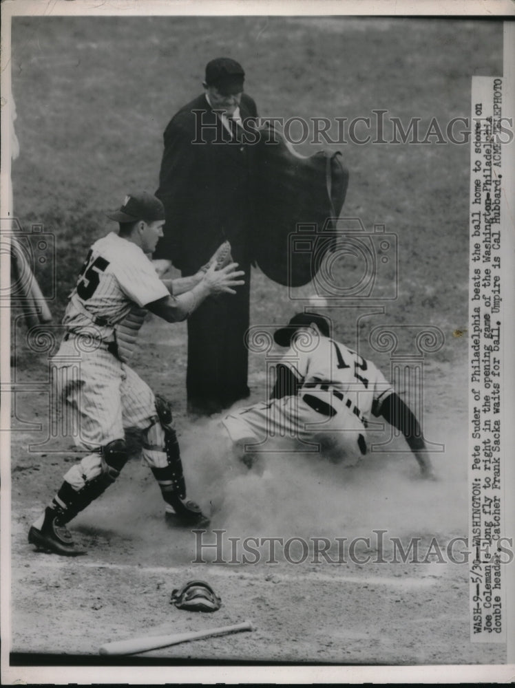 1951 Press Photo Pete Suder of Philadelphia Scores, Frank Sacka of Washington - Historic Images