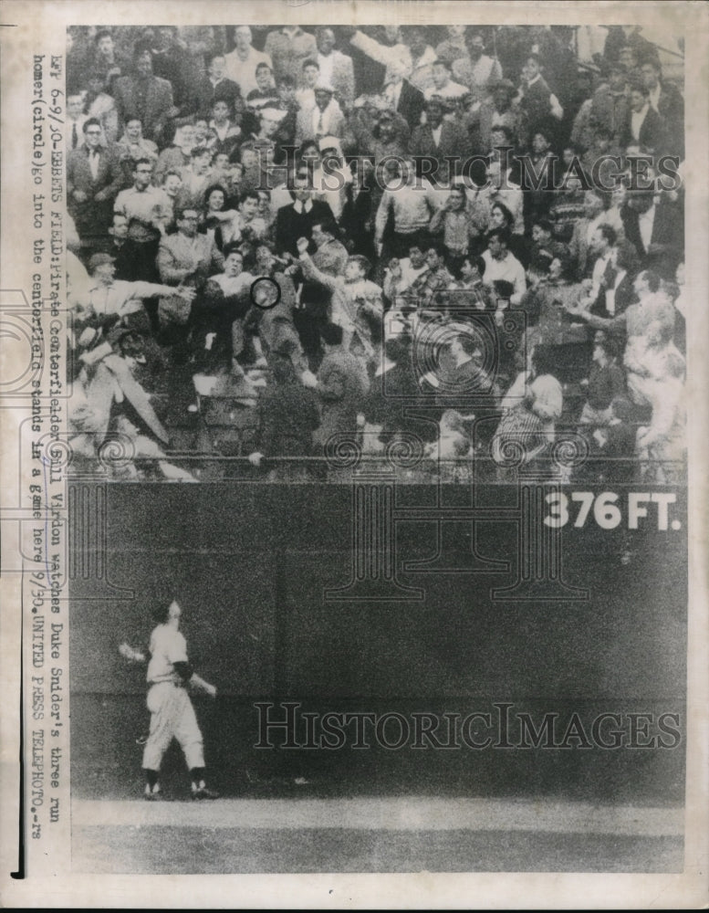 1956 Press Photo Pirates Bill Virdon Watches Duke Snider's Home Run in Stands - Historic Images