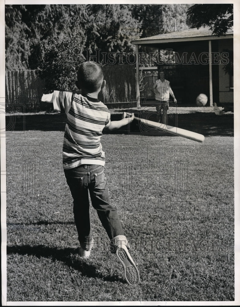 1961 Press Photo Mrs Ruben Chittock & son Mark play baseball - nes00961 - Historic Images