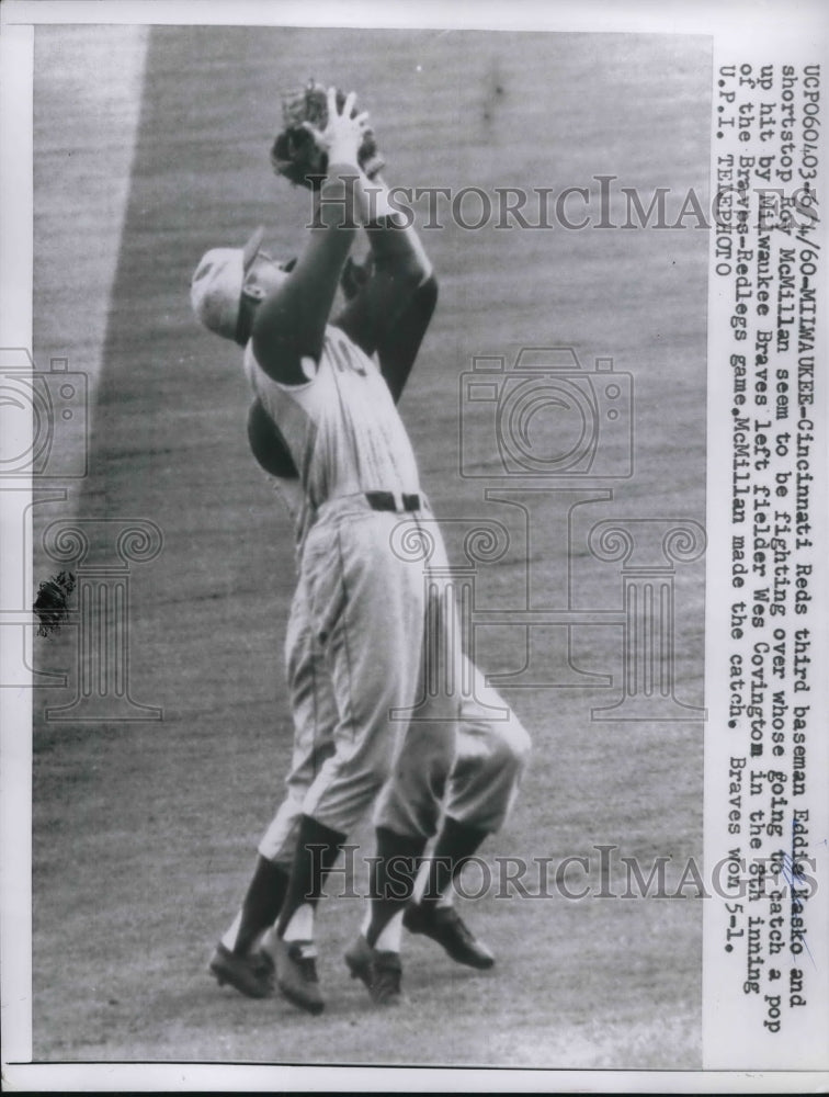 1960 Press Photo Eddie Hasko, Roy McMillan fight over catching a pop fly - Historic Images