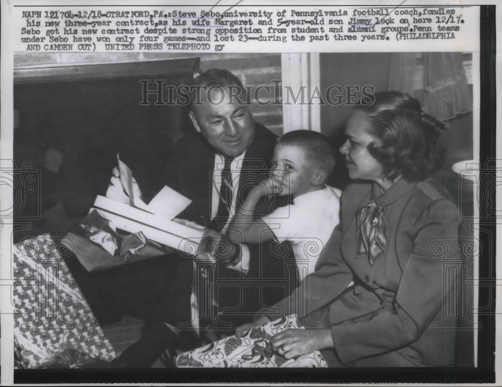 1956 Press Photo Steve Sebo Univ.of Pennyslvania football coach show is contract - Historic Images