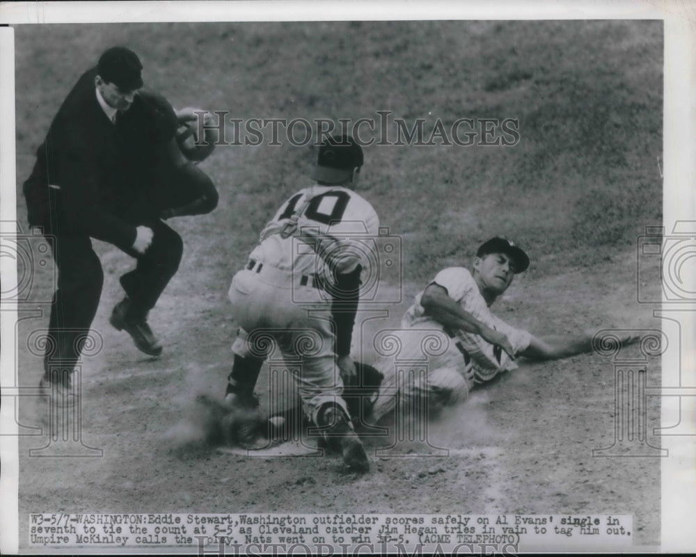 Press Photo Washington Outfielder Eddie Stewart Scores on Cleveland's Jim Hegan - Historic Images